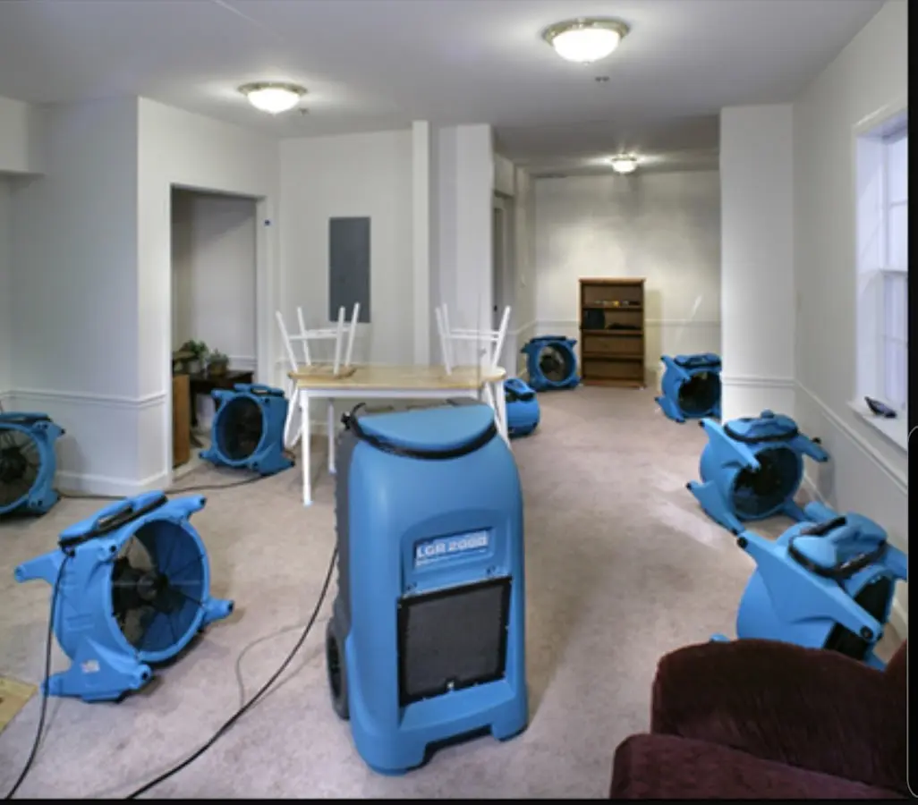 Air movers and dehumidifier setup for Water Damage Restoration in Polk City